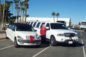 Lexani Limousine's Billy Jinks with two of his limos.